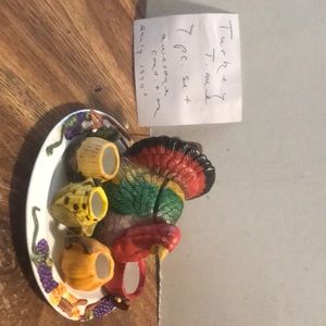 7 piece  ceramic mini teapot set with creamer n sugar bowls n 2 cups.    Top of